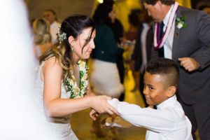 Hoopes Events | Tessa and Taani | Utah State Capitol | Salt Lake City Utah | Bride Dancing with Young Boy Tessa_Taani_Utah_State_Capitol_Salt_Lake_City_Utah_Bride_Dancing_With_Young_Boy.jpg