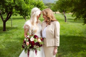 Hoopes Events | Tori and Sterling | Quiet Meadow Farms | Mapleton Utah | Bride and Mother in Orchard Sharing a Moment of Fun Tori_Sterling_Quiet_Meadow_Farms_Mapleton_Utah_Bride_Mother_in_Orchard.jpg