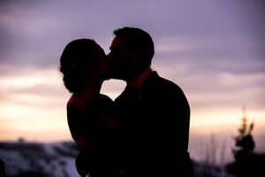 Ilana_Dave_Stein_Eriksen_Lodge_Deer_Valley_Park_City_Utah_Bride_Groom_Kissing_At_Sunset.jpg