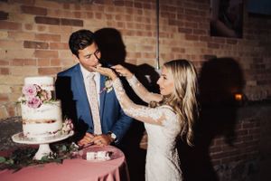 Feeding the Groom Cake Reception