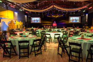 Hoopes Events | The Local Pages | 2017 | Infinity Event Center | Salt Lake City Utah | Table Settings with Stage in Background The_Local_Pages_2017_Infinity_Event_Center_Salt_Lake_City_Utah_Stage_Background.jpg