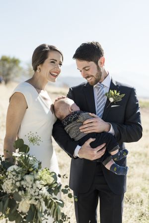 Couple with Infant Nephew Bride and Groom