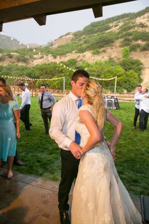 Hoopes Events | Tori and Sterling | Quiet Meadow Farms | Mapleton Utah | Bride and Groom Kissing After Garter Toss Tori_Sterling_Quiet_Meadow_Farms_Mapleton_Utah_Bride_Groom_Kissing_After_Garter_Toss.jpg