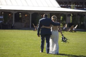 Hoopes Events | McCall and Brad | DeJoria Center | High Star Ranch | Kamas Utah | Bride and Groom Walking Arm-in-Arm McCall_Brad_High_Star_Ranch_Kamas_Utah_Bride_Groom_Arm_in_Arm.jpg