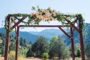 Hoopes Events | Kristin and Haven | Blacksmith Fork Canyon | Hyrum Utah | Flower-Draped Wooden Arch Backdrop Kristin_Haven_Blacksmith_Fork_Canyon_Hyrum_Utah_Flower_Draped_Wooden_Arch.jpg