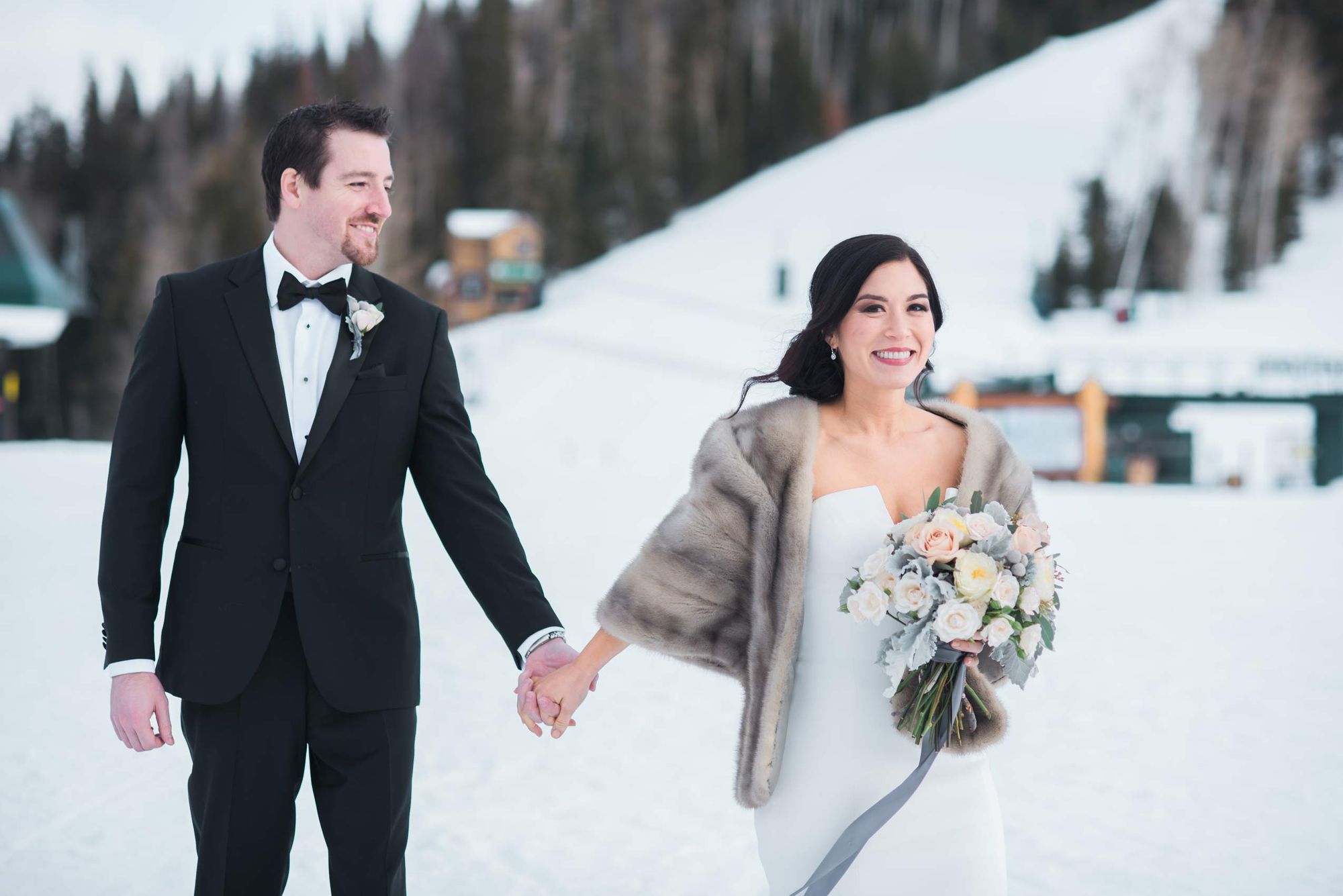 Julia_Mark_Silver_Lake_Lodge_Deer_Valley_Resort_Park_City_Utah_Happy_Couple_Walking_In_Snow.jpg