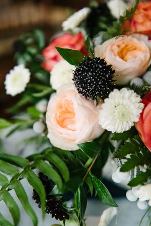 Hoopes Events | Rocky Mountain Bride | Winter Elopement | Deer Valley | Empire Lodge | Park City Utah | Coral, Blush and Green Floral Centerpiece Detail Rocky_Mountain_Bride_Winter_Elopement_Deer_Valley_Empire_Lodge_Deer_Valley_Resort_Park_City_Utah_Table_Detail_Coral_Blush_Green_Floral_Centerpiece_Detial.jpg