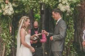 Groom Placing Ring on Bride's Finger Ceremony