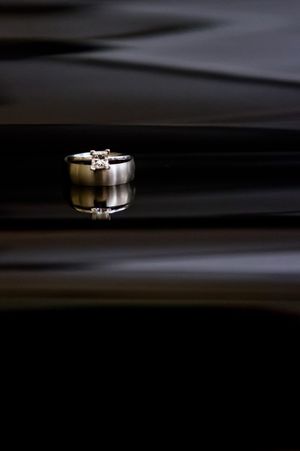Hoopes Events | Shauna and Blake | Northampton House | American Fork Utah | Wedding Rings Reflected on Shiny Black Wood Shauna_Blake_Northampton_House_American_Fork_Utah_Wedding_Rings_Reflected.jpg