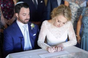 Bride and Groom Signing Ketubah Ceremony