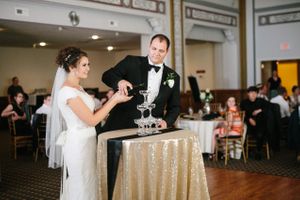 Hoopes Events | Chloe and Austin | Ben Lomond Suites | Ogden Utah | The Great Gatsby Wedding | Pouring Martinelli's Into Champagne Glasses Chloe_Austin_Ben_Lomond_Suites_Ogden_Utah_Great_Gatsby_Pouring_Martinellis_Champagne_Glasses.jpg