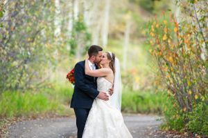 Hoopes Events | April and Matt | Legacy Lodge | Park City Mountain Resort | Park City Utah | Bride and Groom Kissing After Wedding April_Matt_Park_City_Legacy_Lodge_Park_City_Utah_Bride_Groom_Kissing.jpg