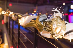 Decorated Handrail with Mardi Gras Masks Sizzling Platters 2015