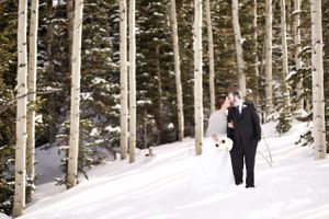 Kissing in Snow Bride and Groom