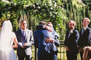 Groom Giving Bride's Father a Hug Ceremony