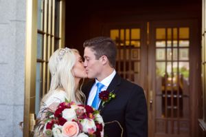 Hoopes Events | Tori and Sterling | Quiet Meadow Farms | Mapleton Utah | Bride and Groom Kissing Outside Draper Temple Doors Tori_Sterling_Quiet_Meadow_Farms_Mapleton_Utah_Bride_Groom_Kissing_Temple_Doors.jpg