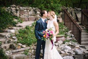 Hoopes Events | Claire and Scott | Millcreek Inn | Salt Lake City Utah | Bride and Groom Kissing in a Rock Garden Claire_Scott_Millcreek_Inn_Salt_Lake_City_Utah_Bride_Groom_Kissing_Rock_Garden.jpg