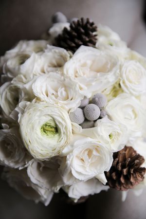 Bridal Bouquet With White Flowers and Pine Cones Details