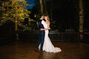 Hoopes Events | Claire and Scott | Millcreek Inn | Salt Lake City Utah | Bride and Groom Dancing with Delicately Lighted Trees in Background Claire_Scott_Millcreek_Inn_Salt_Lake_City_Utah_Bride_Groom_Dancing_Delicately_Lighted_Trees.jpg