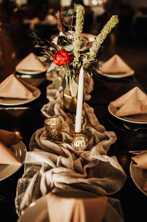 Table Runner With Gold Votives and Flowers Reception