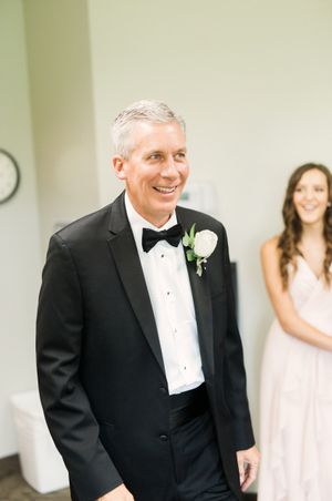 Surprised Father-of-the-Bride Getting Ready