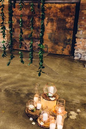 Hoopes Events | Modern Industrial Shoot | The Historic Startup Building | Provo Utah | Elegant Candles with Simple Greenery Backdrop Modern_Industrial_Wedding_Shoot_The_Historic_Startup_Building_Provo_Utah_Candles_Greenery_Backdrop.jpg