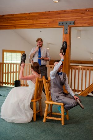 Hoopes Events | Ashley and Dan | Solitude Resort | Solitude Utah | Reception | Bride and Groom Playing Quiz Game with Shoes Ashley_Dan_Solitude_Resort_Solitude_Utah_Bride_Groom_Playing_Show_Quiz_Game_During_Reception.jpg