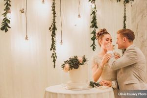 Hoopes Events | Lexie and Neil | Utah State Capitol | Salt Lake City Utah | Bride and Groom Feeding Each Other Wedding Cake Lexie_Neil_Utah_State_Capitol_Salt_Lake_City_Utah_Bride_Groom_Feeding_Each_Other_Cake.jpg