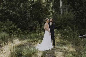 Happy Bride and Groom Posing in Field First Look