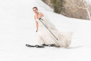 Ilana_Dave_Canyons_Resort_Park_City_Utah_Bride_Skiing_Down_Slope_in_Wedding_Dress.jpg