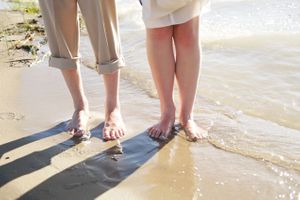 Hoopes Events | Aspyn and Steven | Bear Lake Utah | Bride and Groom Walk Barefoot in the Sand Along the Lake Aspyn_Steven_Bear_Lake_Utah_Barefoot_In_Sand.jpg