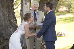 Hoopes Events | McCall and Brad | DeJoria Center | High Star Ranch | Kamas Utah | Bride Laughing During Wedding Ceremony McCall_Brad_High_Star_Ranch_Kamas_Utah_Laughing_Bride.jpg