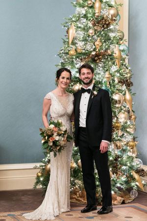 Bride and Groom in Front of Christmas Tree Bride and Groom in Front of Christmas