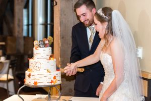 Hoopes Events | April and Matt | Legacy Lodge | Park City Mountain Resort | Park City Utah | Cutting the Cake with an Axe April_Matt_Park_City_Legacy_Lodge_Park_City_Utah_Cake_Cutting.jpg