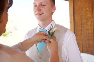 Hoopes Events | Aspyn and Steven | Bear Lake Utah | Putting Boutonniere on Groom Aspyn_Steven_Bear_Lake_Utah_Groom_Boutonniere.jpg