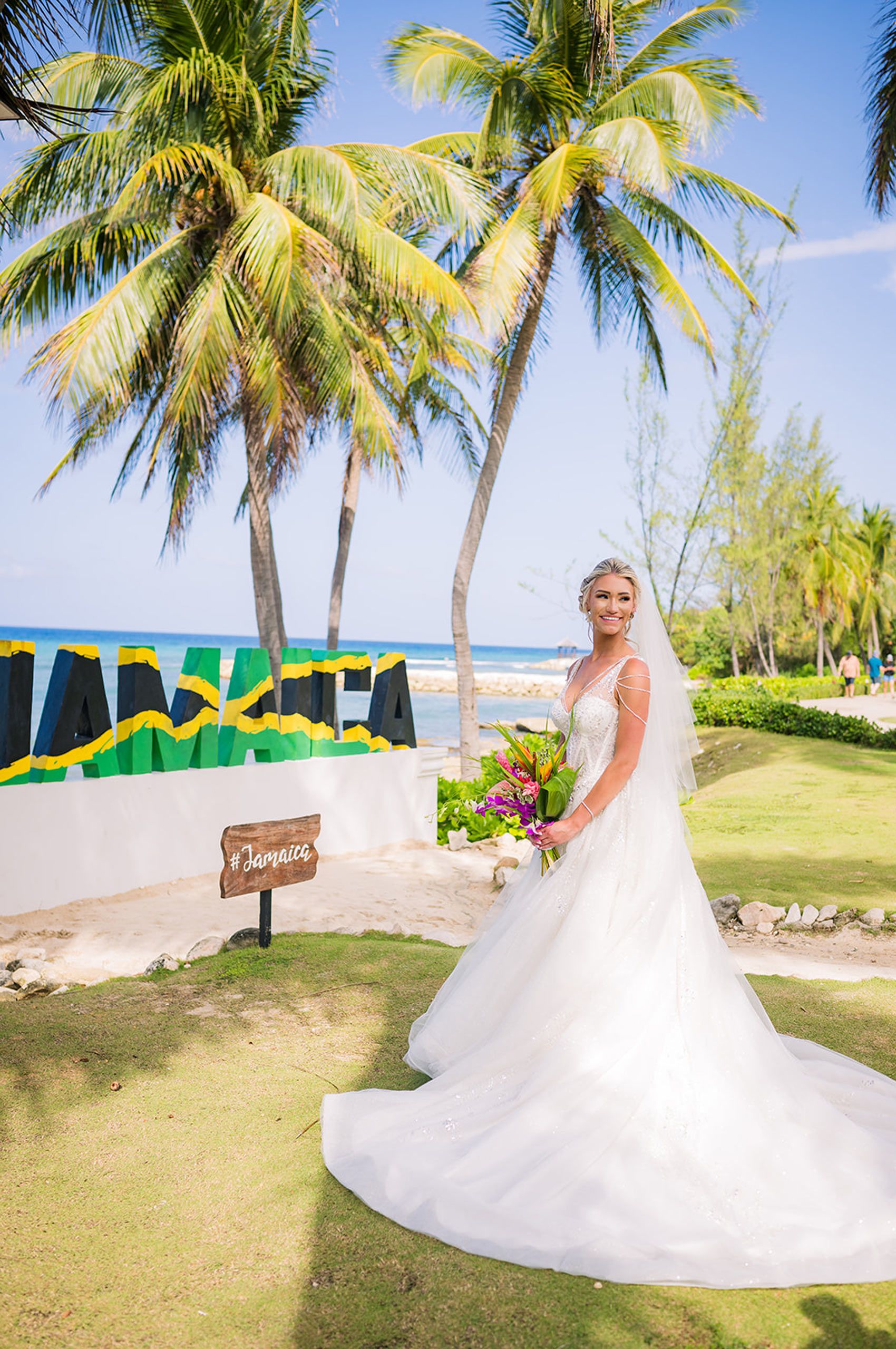 Bride Posing by Jamaica Sign