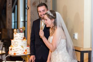 Hoopes Events | April and Matt | Legacy Lodge | Park City Mountain Resort | Park City Utah | Ready to Cut Cake Using and Axe April_Matt_Park_City_Legacy_Lodge_Park_City_Utah_Ready_to_Cut_Axe.jpg