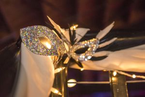 Mardi Gras Mask on Handrail Sizzling Platters 2015