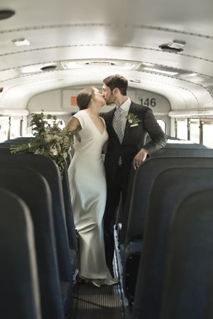 Kissing on Bus Bride and Groom