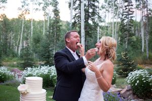 Hoopes Events | Evelyn and Kevin | Park City Utah | Bride and Groom Eating the Wedding Cake Evelyn_Kevin_Park_City_Utah_Eating_Cake.jpg