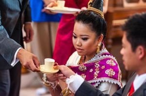 Bride and Groom Participate In Ceremony Ceremony