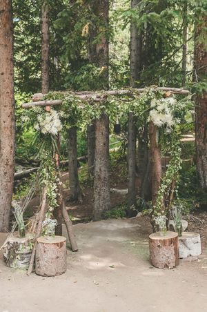 Flower-Crowned, Rustic Arch Ceremoy