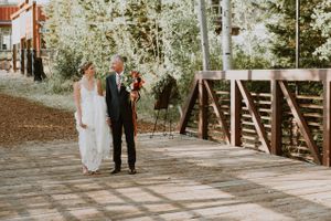 Father Escorting Bride Over Wooden Bridge Ceremony