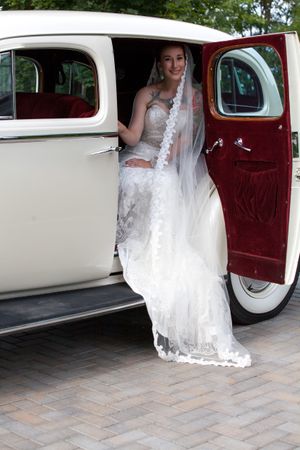 Hoopes Events | Natalie and Brad | South Jordan Utah | Bride in Antique Sendoff Car Natalie_Brad_South_Jordan_Utah_Bride_Sendoff_Car.jpg
