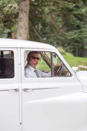 Hoopes Events | Evelyn and Kevin | Park City Utah | Antique Car | Smiling Driver Evelyn_Kevin_Park_City_Utah_Antique_Car_Smiling_Driver.jpg