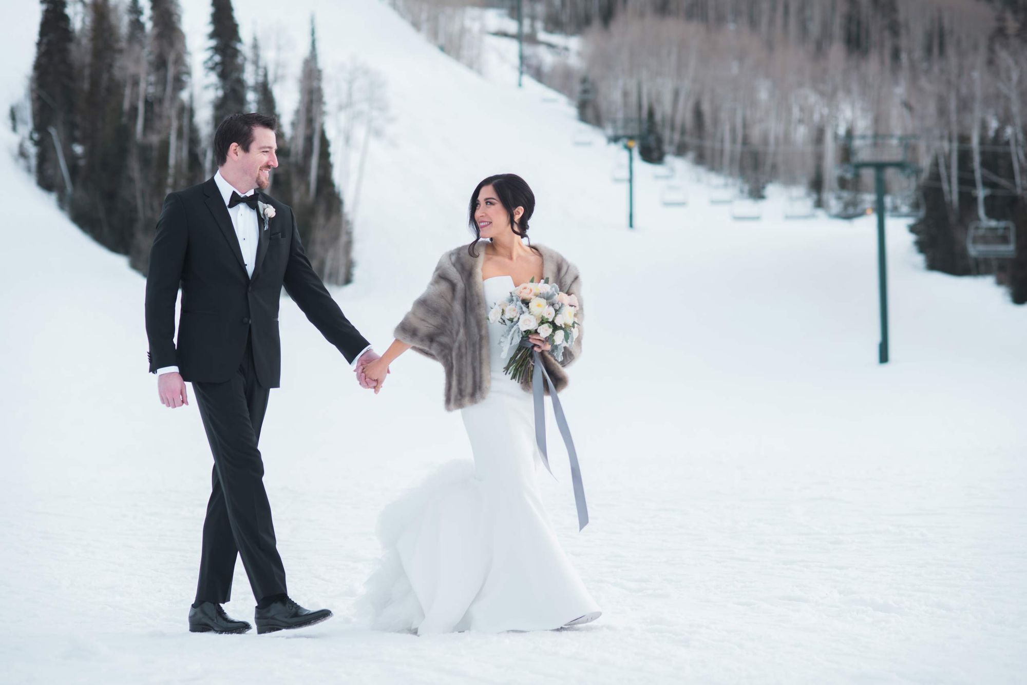 Julia_Mark_Silver_Lake_Lodge_Deer_Valley_Resort_Park_City_Utah_Bride_Groom_Walking_In_Snow.jpg