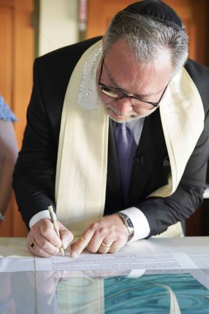 Rabbi Signing Ketubah (Contract) Ceremony