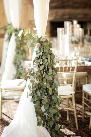 Soft Wood Pillar Draping With Greenery-Accented Ties Details