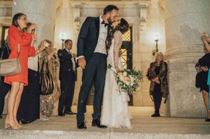 Bride and groom kiss during send off Send Off