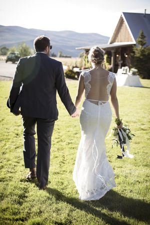 Hoopes Events | McCall and Brad | DeJoria Center | High Star Ranch | Kamas Utah | Bride and Groom Walking Hand-in-Hand McCall_Brad_High_Star_Ranch_Kamas_Utah_Bride_Groom_Hand_in_Hand.jpg